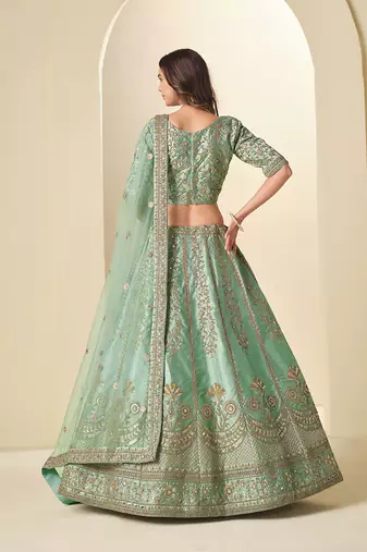 green embroidered art silk blend lehenga choli with matching dupatta