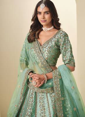green embroidered art silk blend lehenga choli with matching dupatta 4