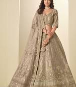 beige embroidered art silk lehenga choli with matching dupatta set
