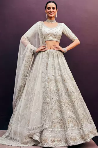 Amazing Off-White Dori Work Net Engagement Wear Lehenga Choli