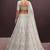 Amazing Off-White Dori Work Net Engagement Wear Lehenga Choli
