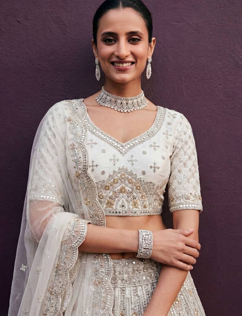 Amazing Off-White Dori Work Net Engagement Wear Lehenga Choli