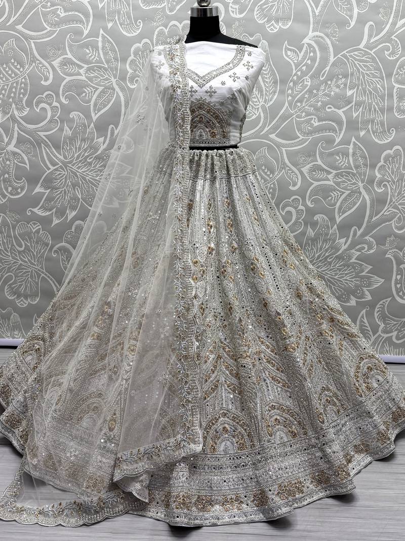 Amazing Off-White Dori Work Net Engagement Wear Lehenga Choli