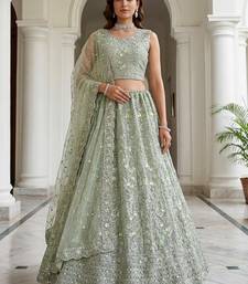 sea green embroidered net lehenga choli with sequins and dupatta