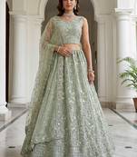 Beautiful Sea Green Embroidered Net Reception Wear Lehenga Choli
