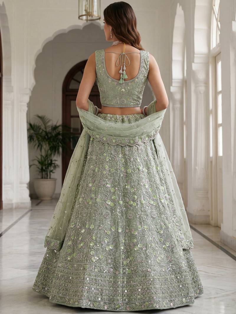 Beautiful Sea Green Embroidered Net Reception Wear Lehenga Choli