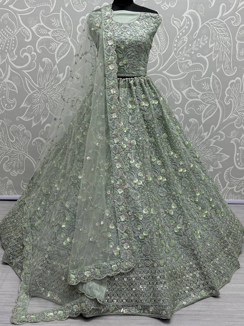 Beautiful Sea Green Embroidered Net Reception Wear Lehenga Choli