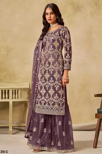 Purple embroidered net salwar suits 