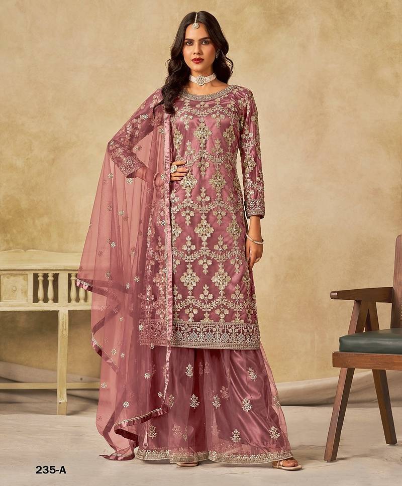 Peach embroidered net salwar suits 