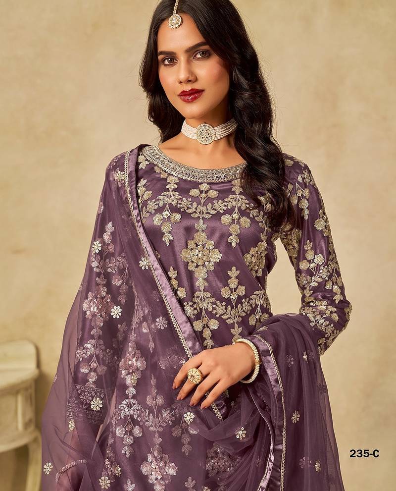 Purple embroidered net salwar suits 