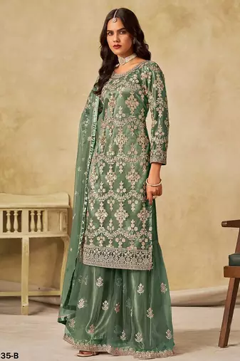 Green embroidered net salwar suits 