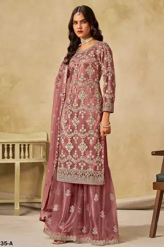 Peach embroidered net salwar suits 