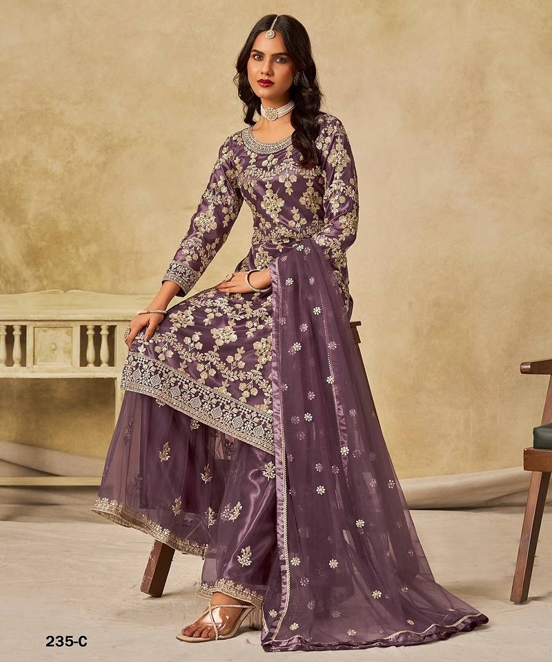 Purple embroidered net salwar suits 