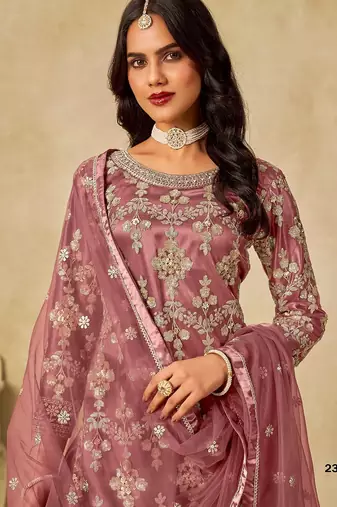 Peach embroidered net salwar suits 