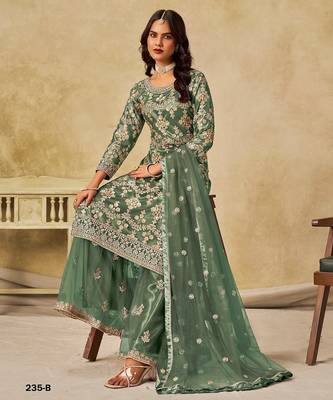 Green embroidered net salwar suits  4