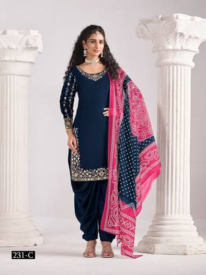 Green silk embroidered salwar suits  1