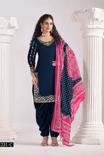 Green silk embroidered salwar suits 