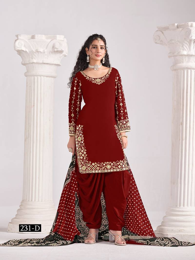 Maroon silk embroidered salwar suits 