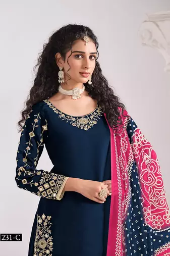 Green silk embroidered salwar suits 