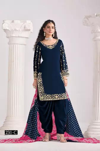 Green silk embroidered salwar suits 