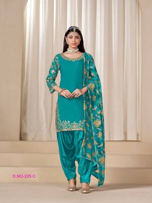 Green silk embroidered salwar suits  1