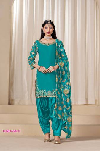 Green silk embroidered salwar suits 
