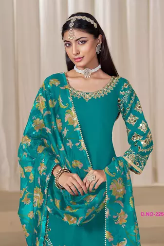 Green silk embroidered salwar suits 