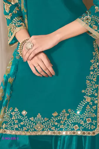 Green silk embroidered salwar suits 