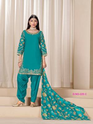 Green silk embroidered salwar suits  4