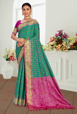 emerald green patola silk blend woven work traditional saree 1