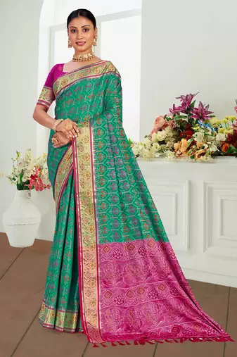 emerald green patola silk blend woven work traditional saree