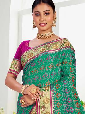 emerald green patola silk blend woven work traditional saree 2