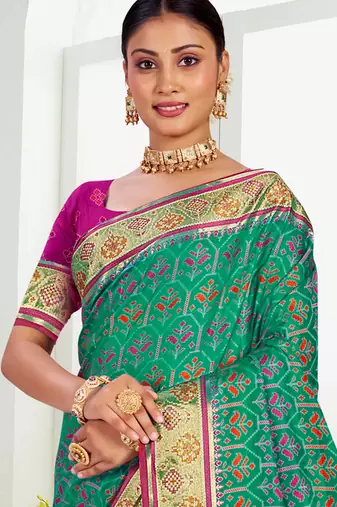 emerald green patola silk blend woven work traditional saree