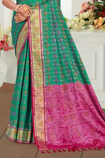 emerald green patola silk blend woven work traditional saree