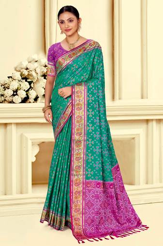emerald green patola silk blend woven work traditional saree