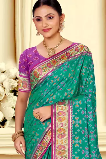 emerald green patola silk blend woven work traditional saree