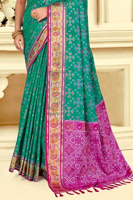 emerald green patola silk blend woven work traditional saree 3