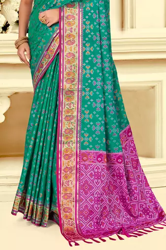 emerald green patola silk blend woven work traditional saree
