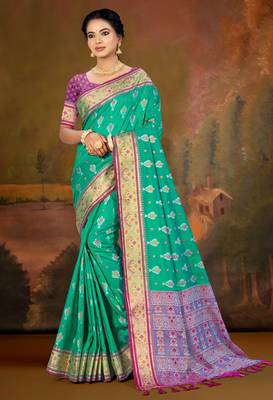 emerald green patola silk blend woven work traditional saree 1