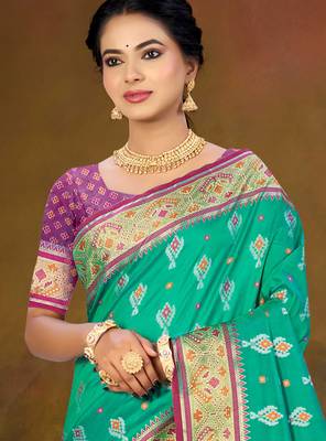 emerald green patola silk blend woven work traditional saree 2