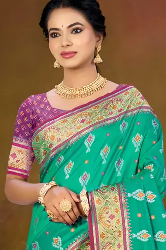 emerald green patola silk blend woven work traditional saree