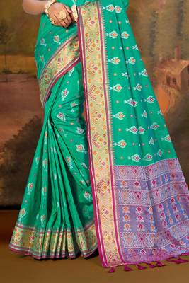 emerald green patola silk blend woven work traditional saree 3