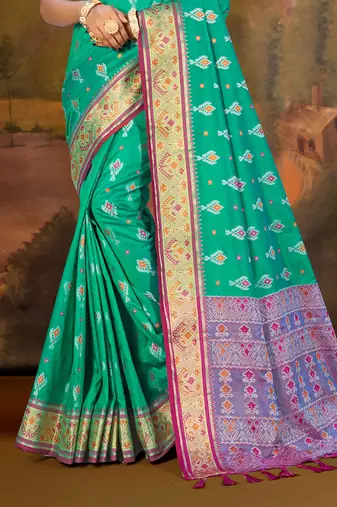 emerald green patola silk blend woven work traditional saree