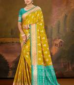 mustard yellow patola silk blend woven work traditional saree
