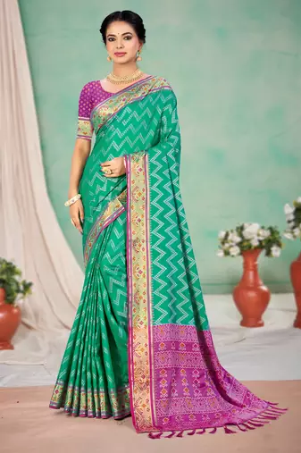 emerald green patola silk blend woven work traditional saree