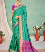 emerald green patola silk blend woven work traditional saree