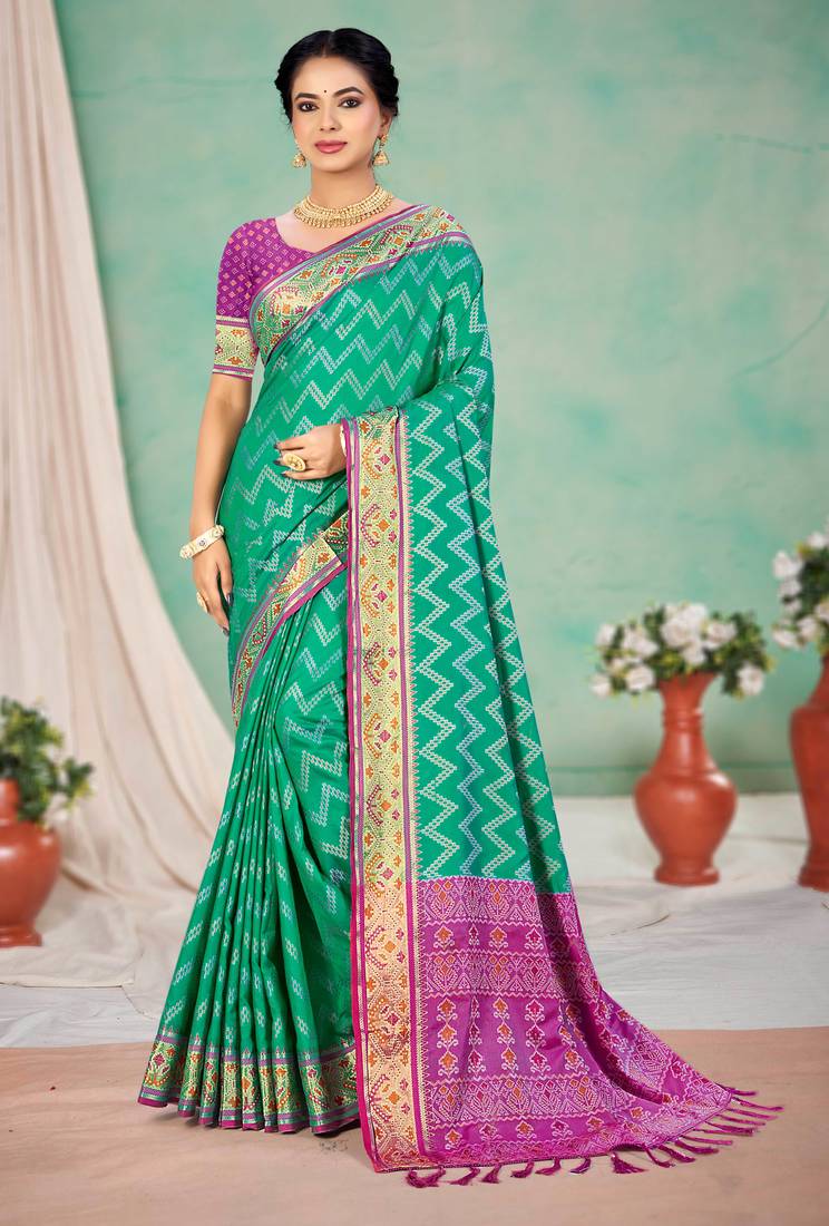 emerald green patola silk blend woven work traditional saree