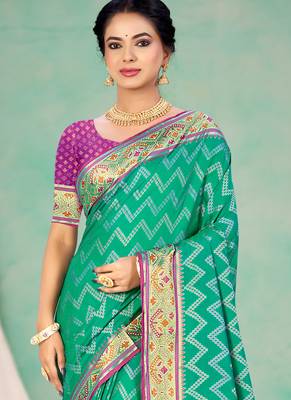 emerald green patola silk blend woven work traditional saree 2