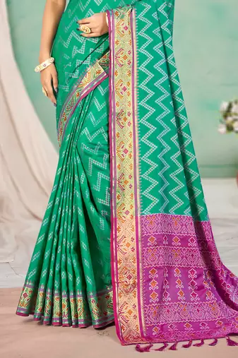 emerald green patola silk blend woven work traditional saree