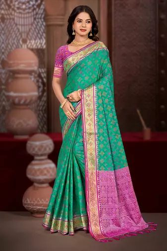 emerald green patola silk blend woven work traditional saree